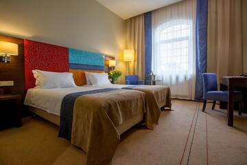 Фото номера Двухместный номер с 2 отдельными кроватями Отель Młyn Jacka Hotel &amp; Spa г. Jaroszowice 2